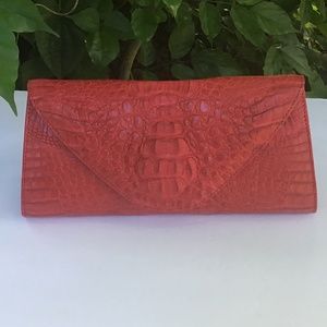 Horned crocodile clutch Bag